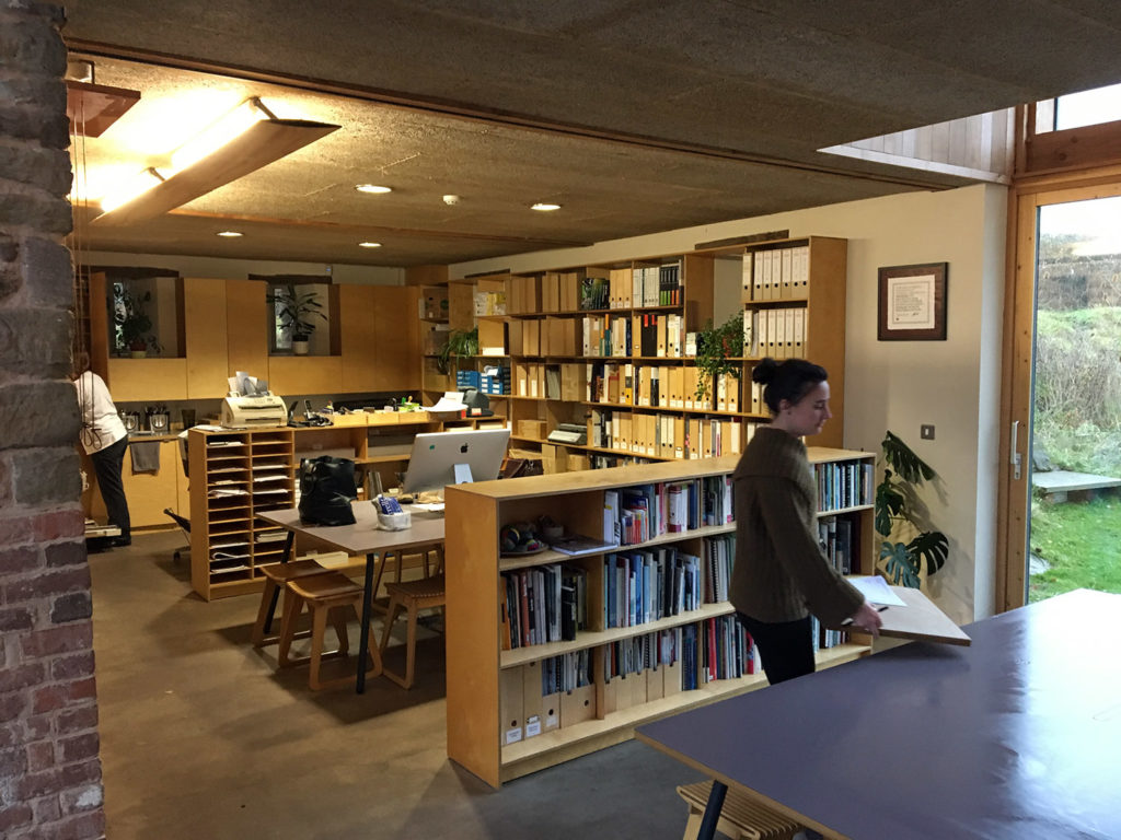 Ground floor kitchen area and library space.